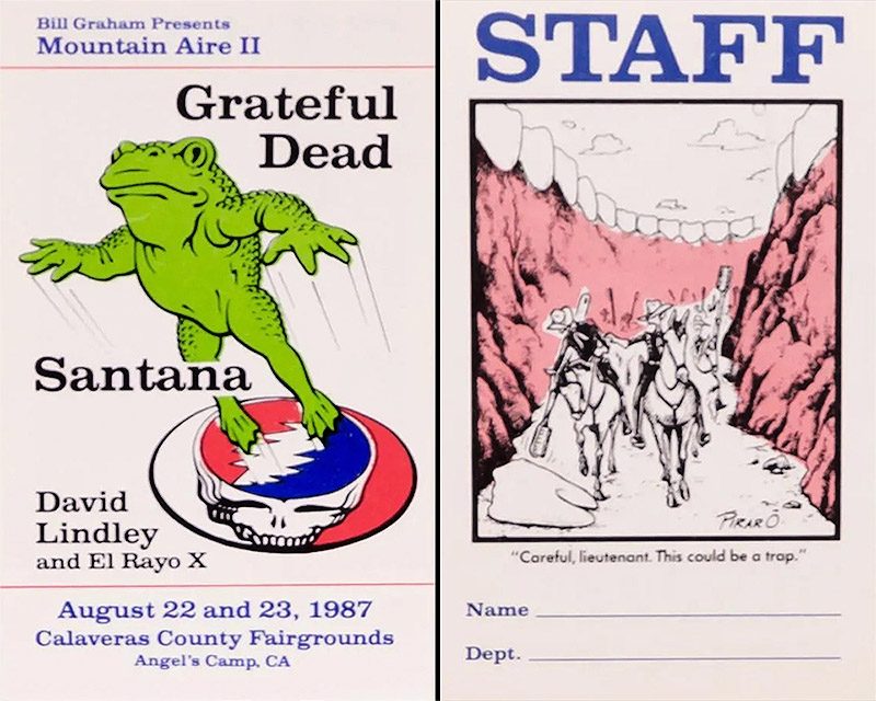 Two sides of a laminated pass. Left: a Bill Graham Presents Mountain Aire II card with a green frog leaping off a Steal Your Face skull, listing Grateful Dead, Santana, David Lindley and El Rayo X, August 22 and 23 1987, Calaveras County Fairgrounds. Right: the word STAFF in blue capitals above a Dan Piraro cartoon of a cavalry patrol riding into a pink canyon whose cliff tops are rows of teeth, captioned Careful, lieutenant. This could be a trap.
